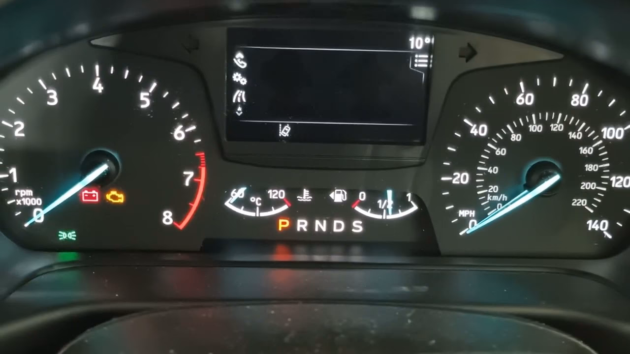 How can you reset the oil change light in a Ford Fiesta?