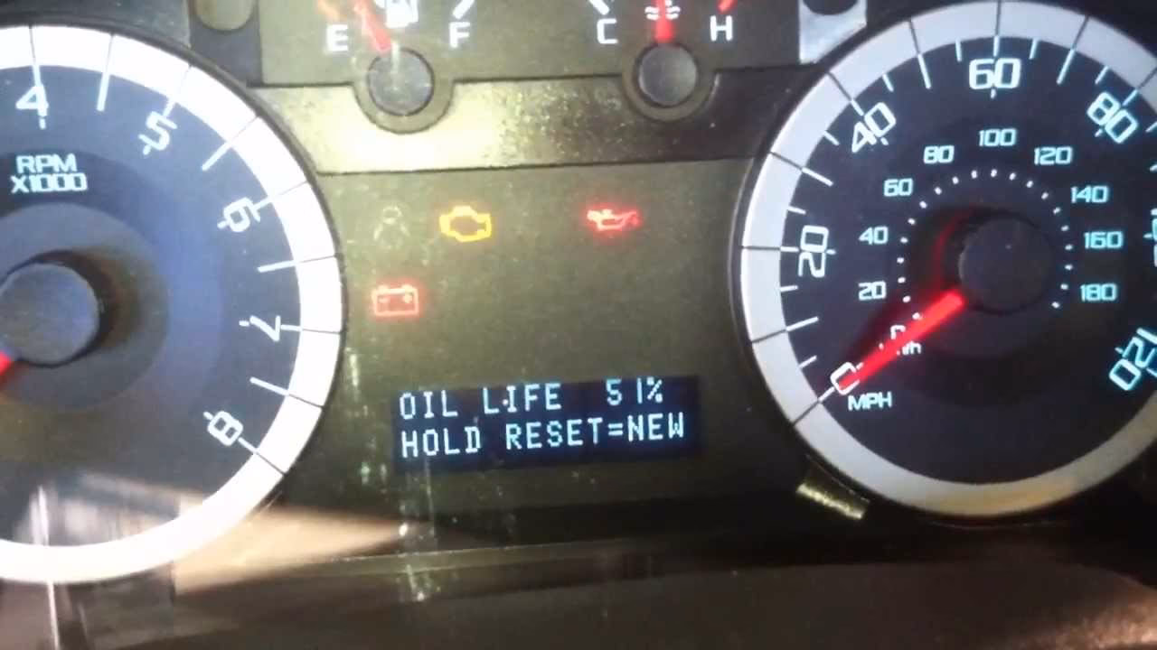 How do I Reset my Ford Escape oil light?