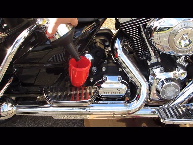 How do you dispose of used oil on a Harley Davidson Road King?