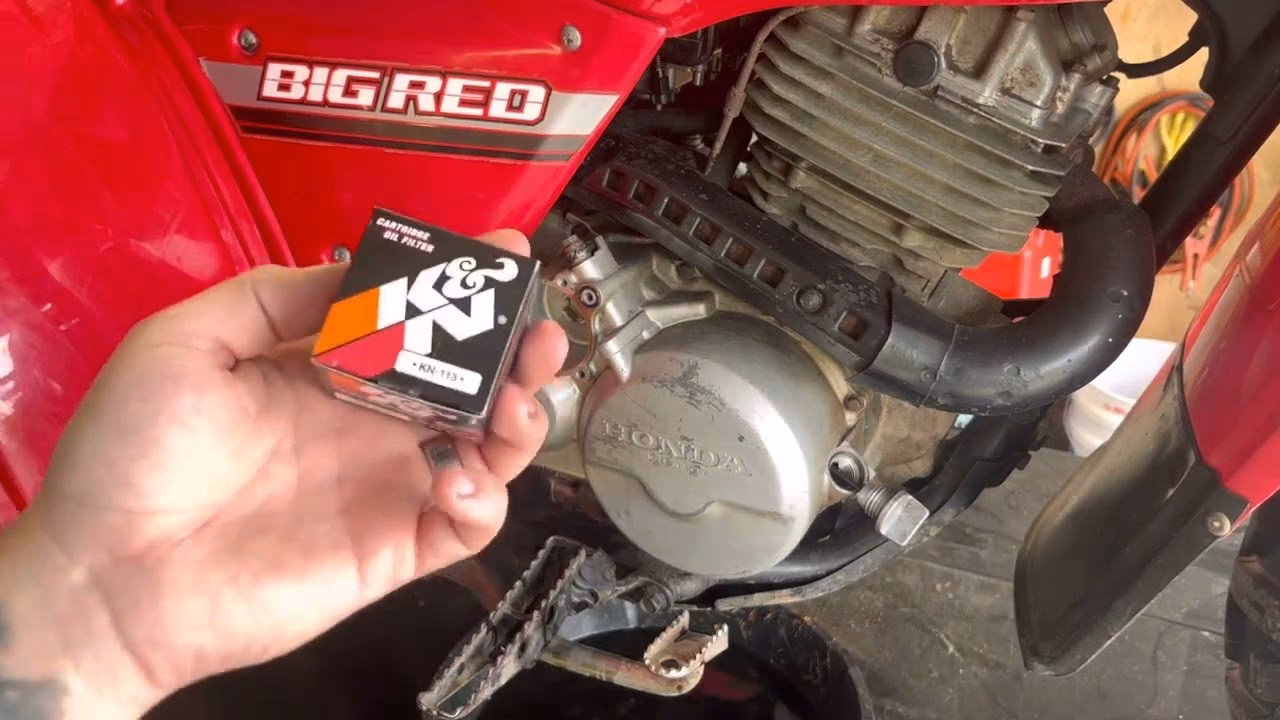 How do I check the oil level on a Honda MUV?