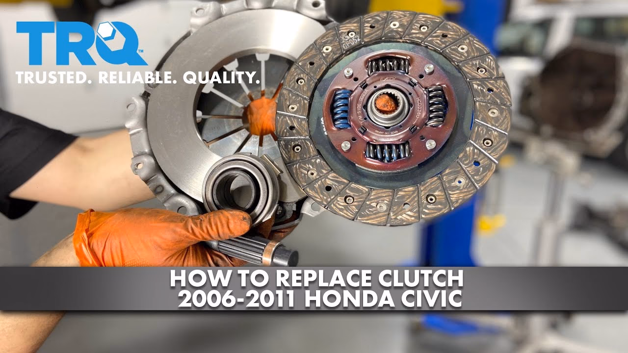 How do I replace the flywheel and clutch on a Honda Civic?
