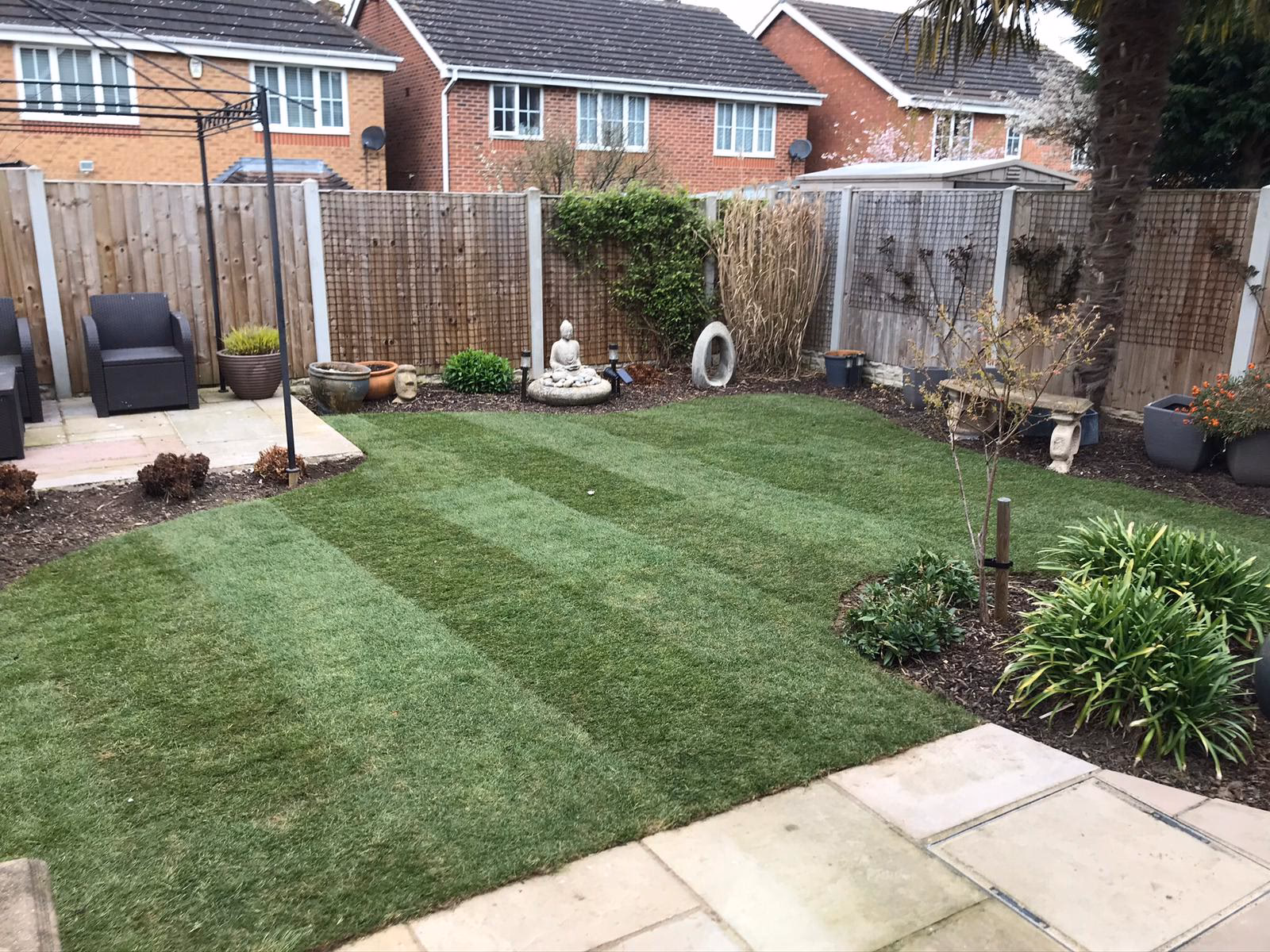 How long after laying grass should I walk on it?