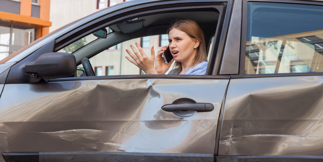 How do you fix a dent in a car?