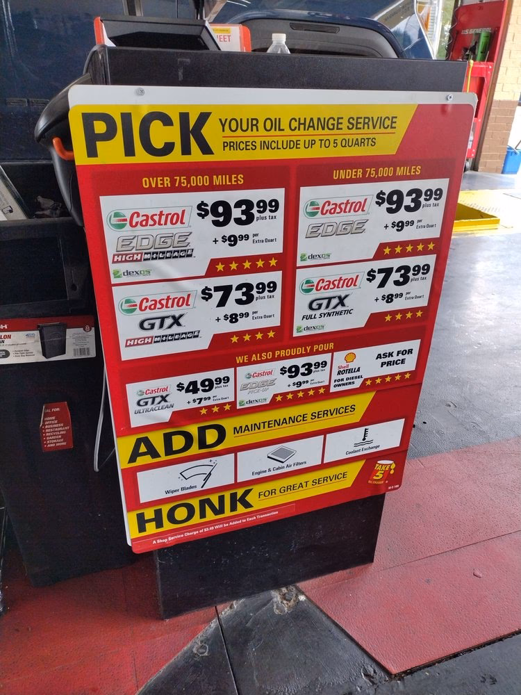 How much does it cost to change oil at shops?
