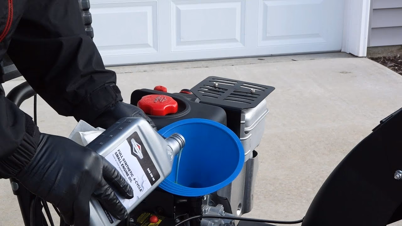 When should I change the oil on my snowblower?