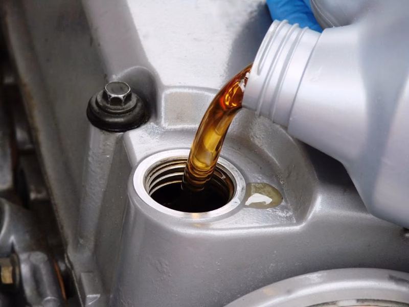 How long should break-in oil be left in the engine?