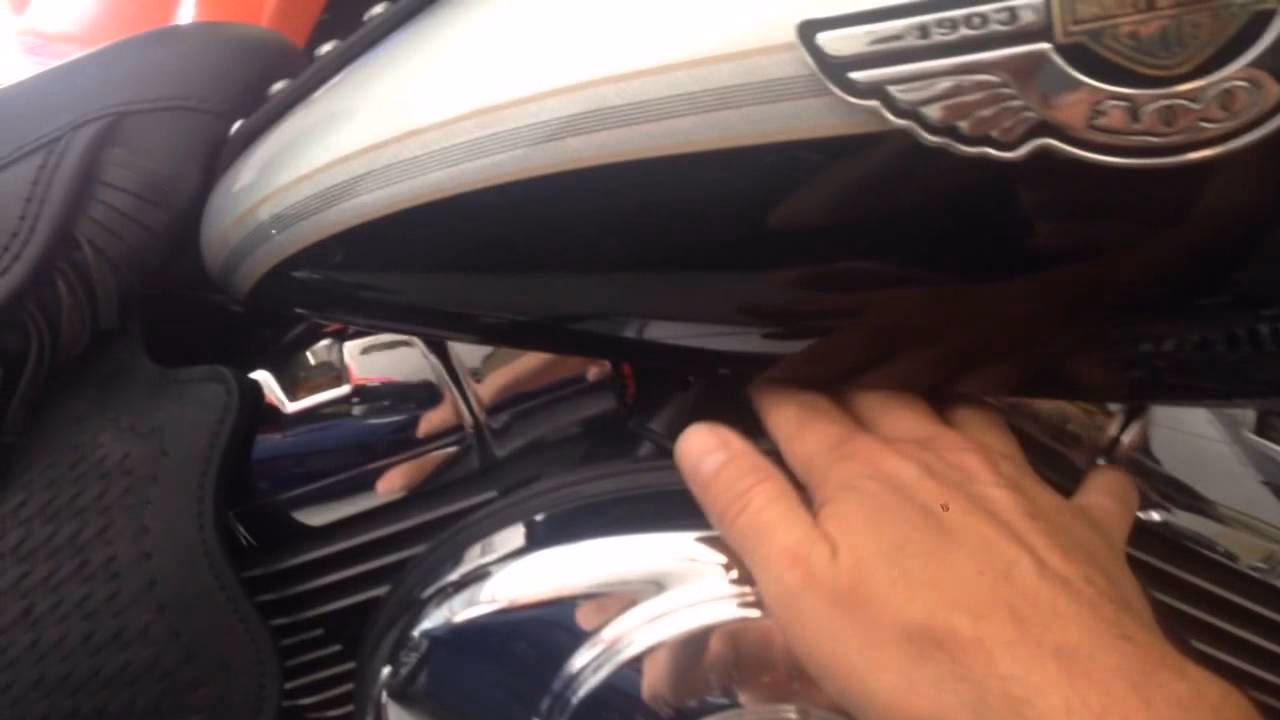 How do you adjust the idle speed on a Sportster?