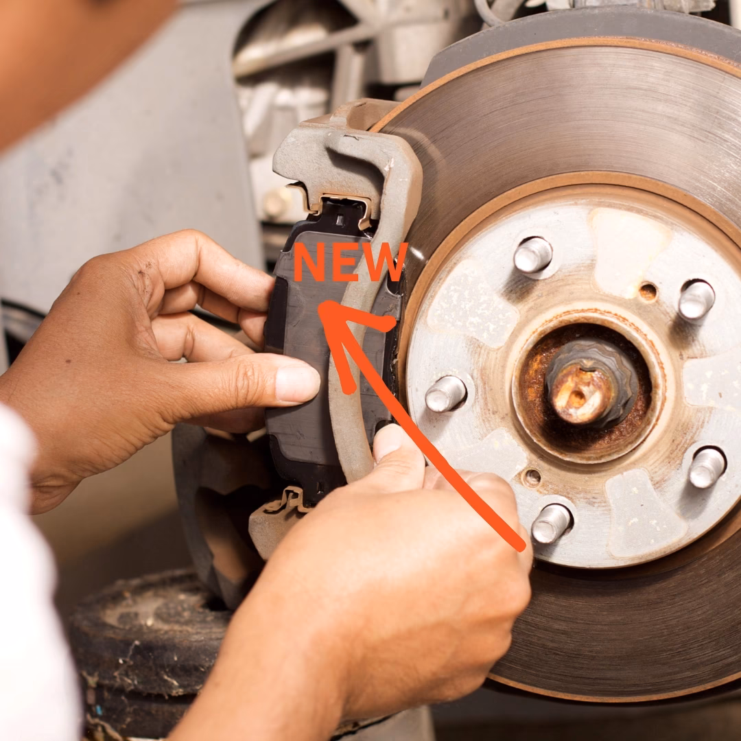 How do you remove a brake pad holder?