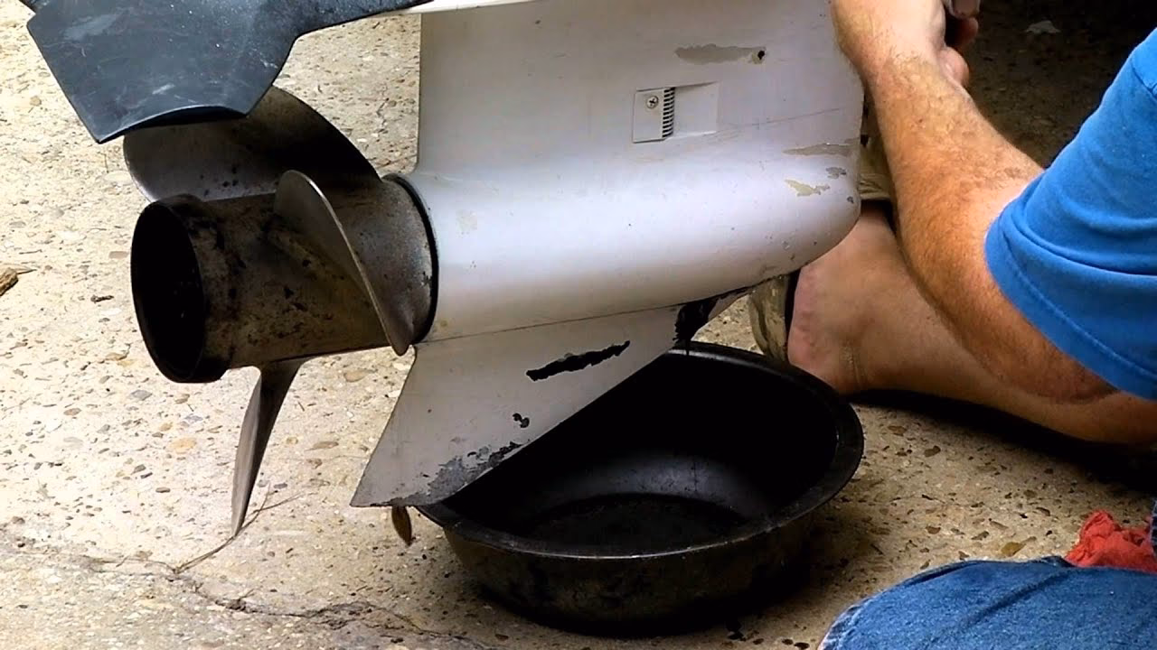 How do I maintain my outboard motor gearbox?