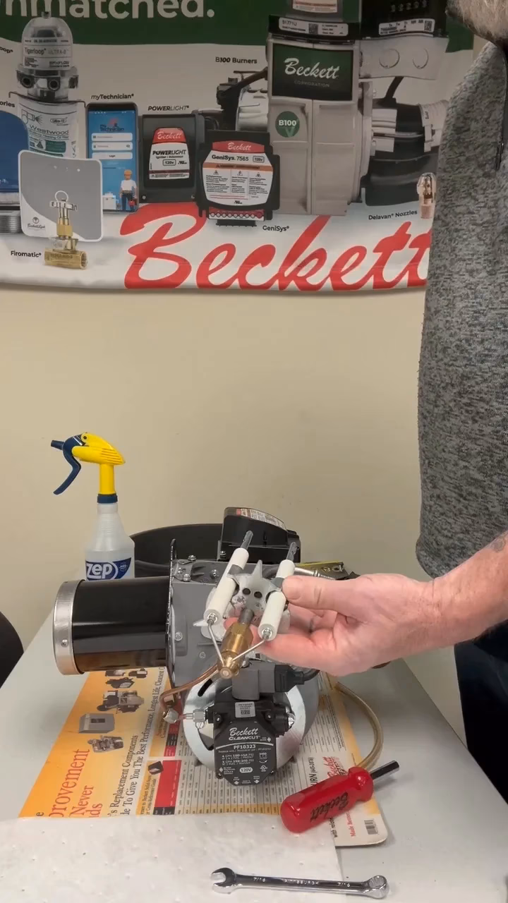 How do you replace a gas burner nozzle?