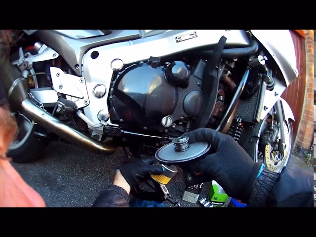How do I change the oil in my bike?