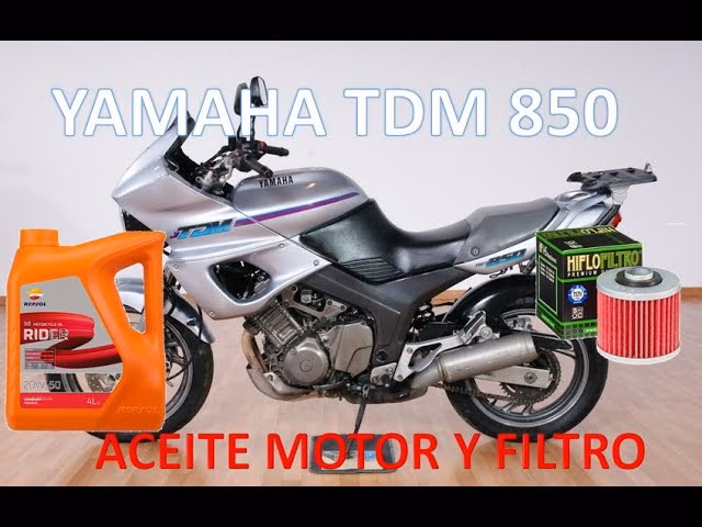 How do you remove a fuel tank from a motorcycle?