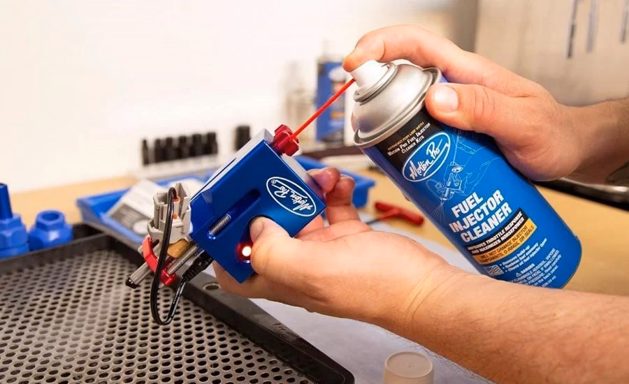 How do you clean a motion pro fuel injector?