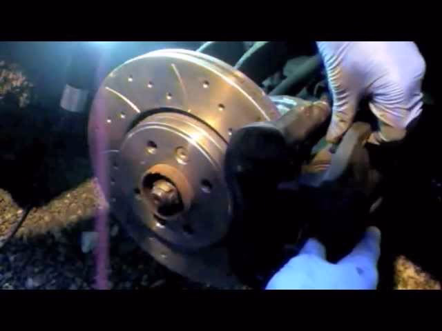 Should I remove the lid of the brake fluid reservoir?