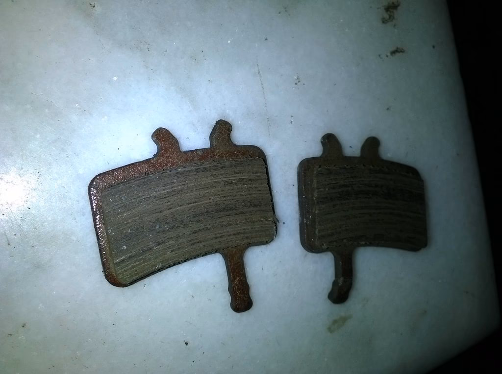 Do contaminated brake pads need to be replaced?