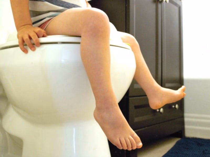 How do I know if a toilet is available on a train?