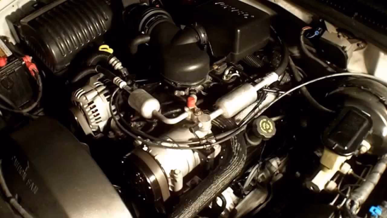 How can you identify a 5.7L Vortec engine?