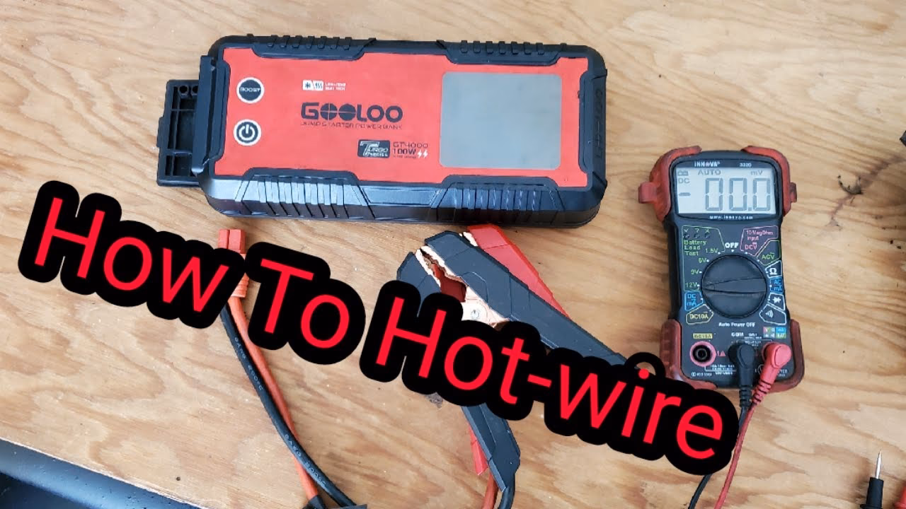 Where is the battery located on a portable jump starter?