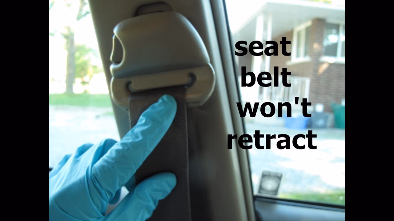 Can a stuck seat belt be repaired or replaced?
