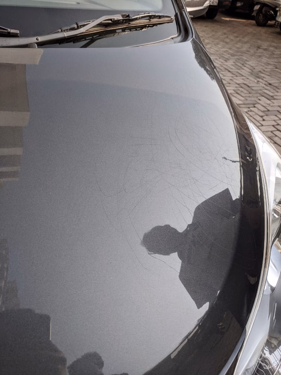 How do you fix a cat scratch on a car?