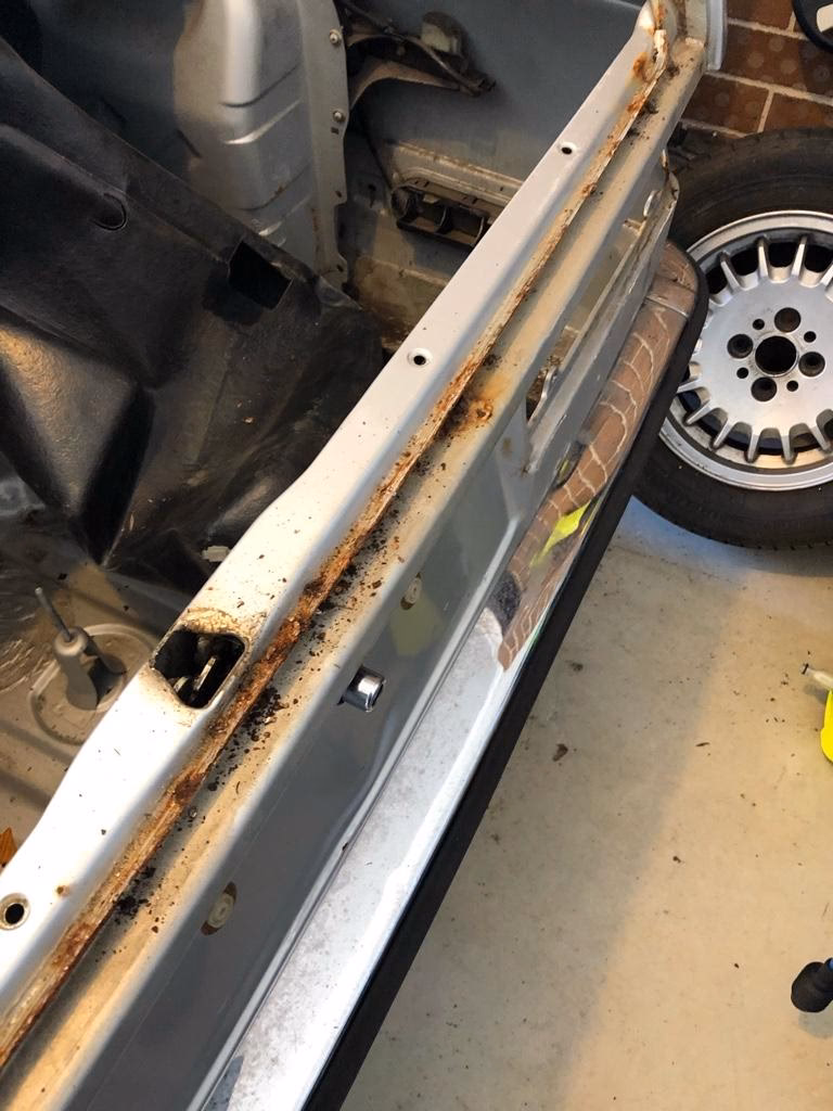 How do I stop rust from spreading on my car?