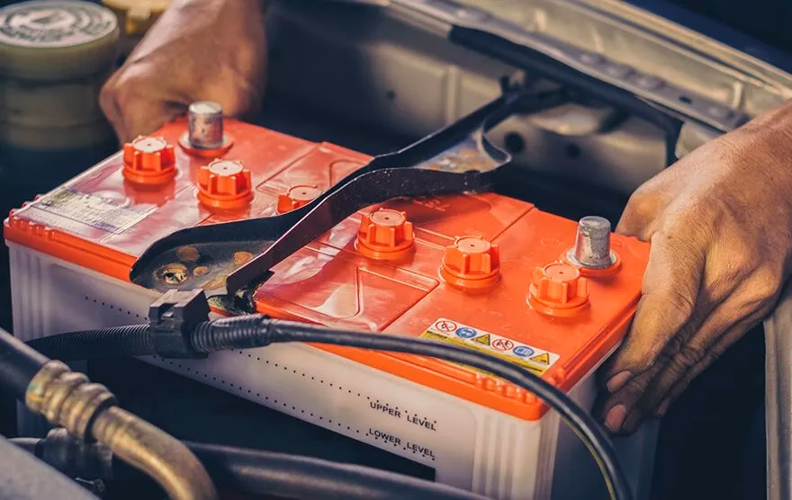 How to service a car battery?
