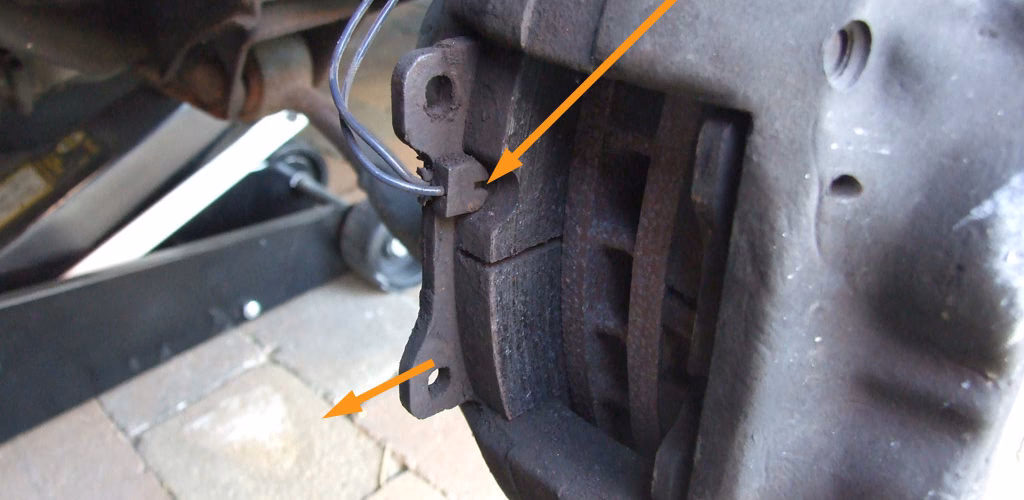 Why does my brake pad light come on?