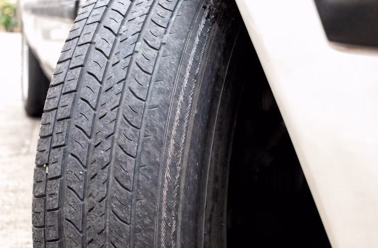 What are the penalties for driving with illegal tyres?