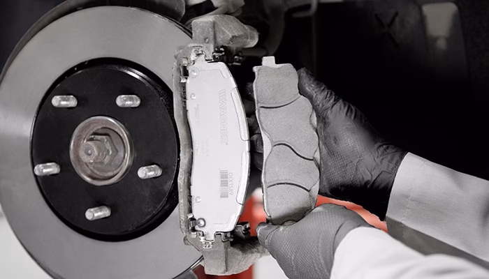 How do you lubricate a brake caliper?