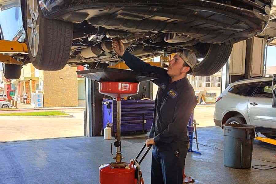 Should I get my car's oil changed at a dealership?