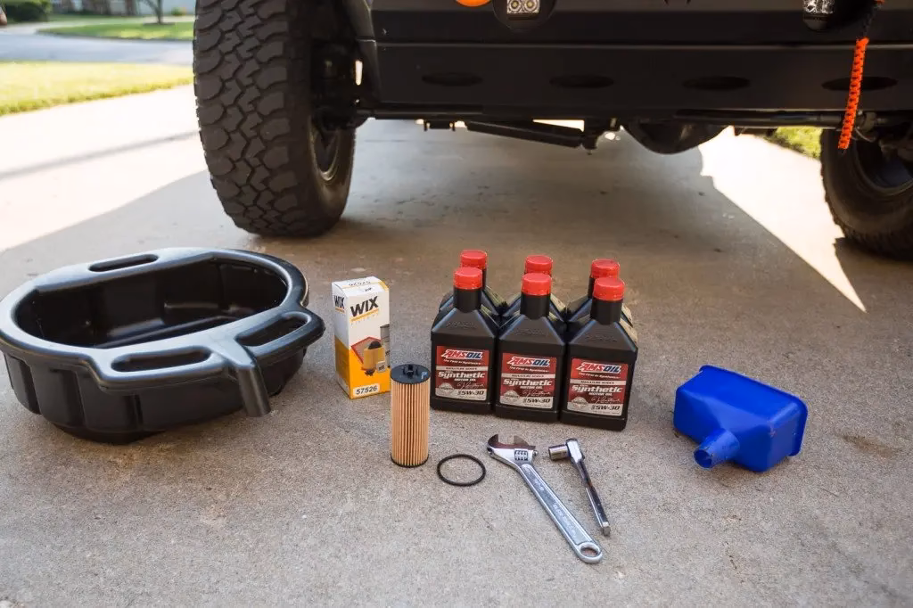 How to reset the change oil message on a Jeep JK Wrangler?