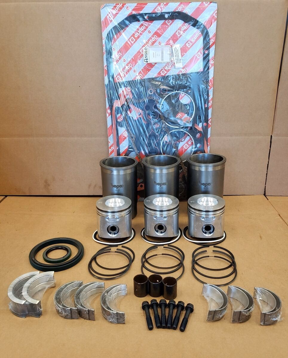 Should I rebuild or repower my JD 318 engine?