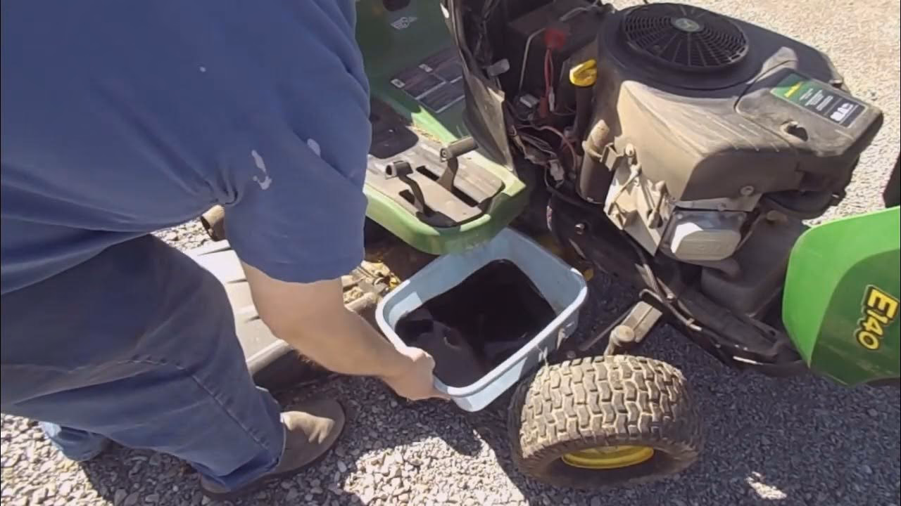 How do I service my John Deere E140 lawn tractor?