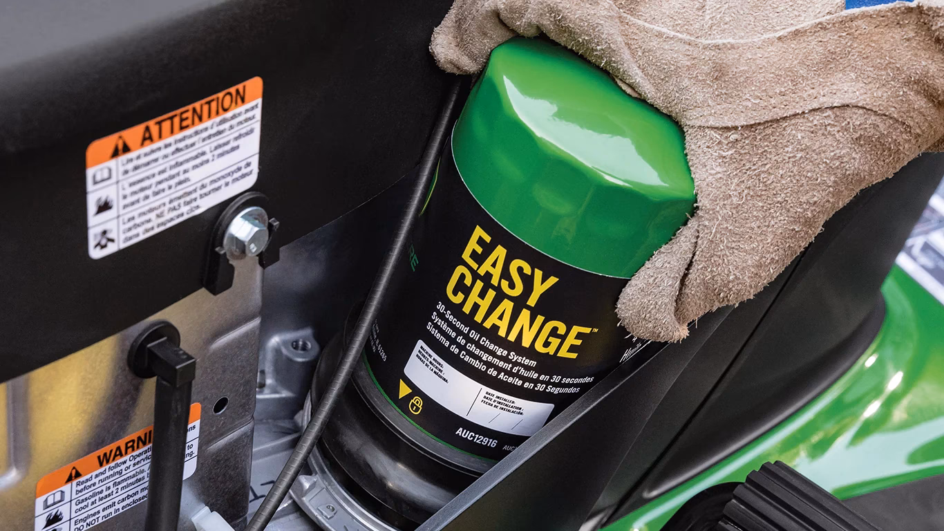 How often should a John Deere engine oil be changed?