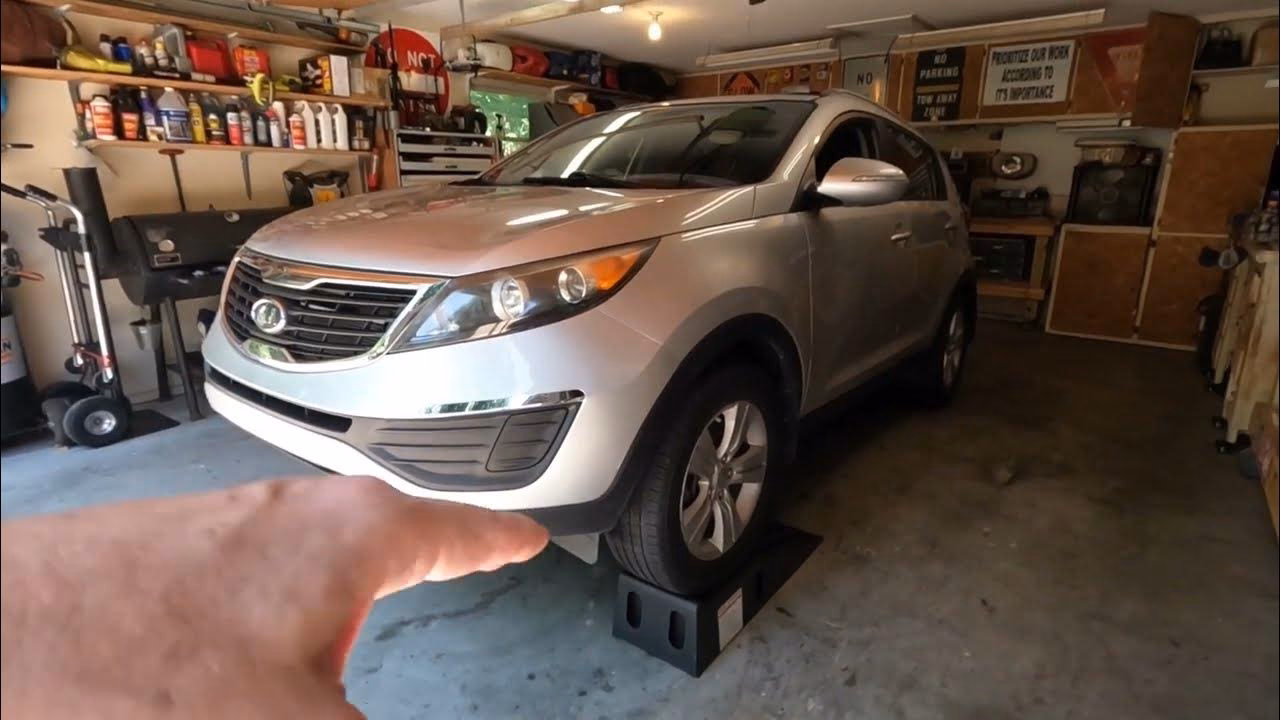 How do I change the oil on my Sportage?