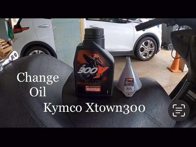 How do you change engine oil on a scooter?
