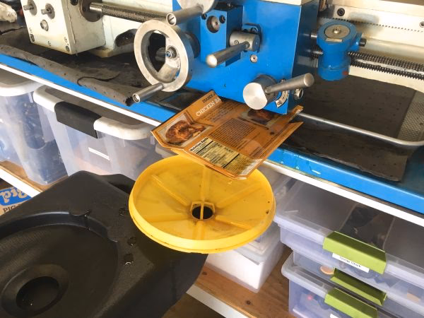 How often should a lathe headstock oil be changed?