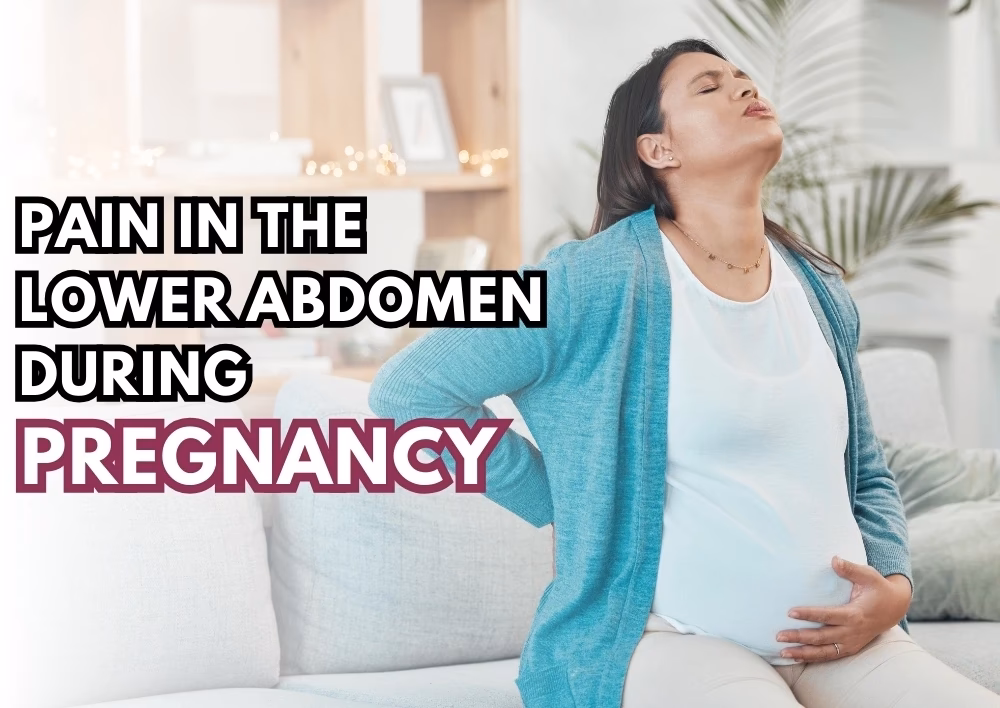 What causes low belly pain during the first trimester?