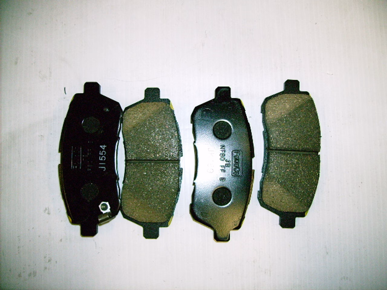How much does a Mazda 2 front brake pad replacement cost?