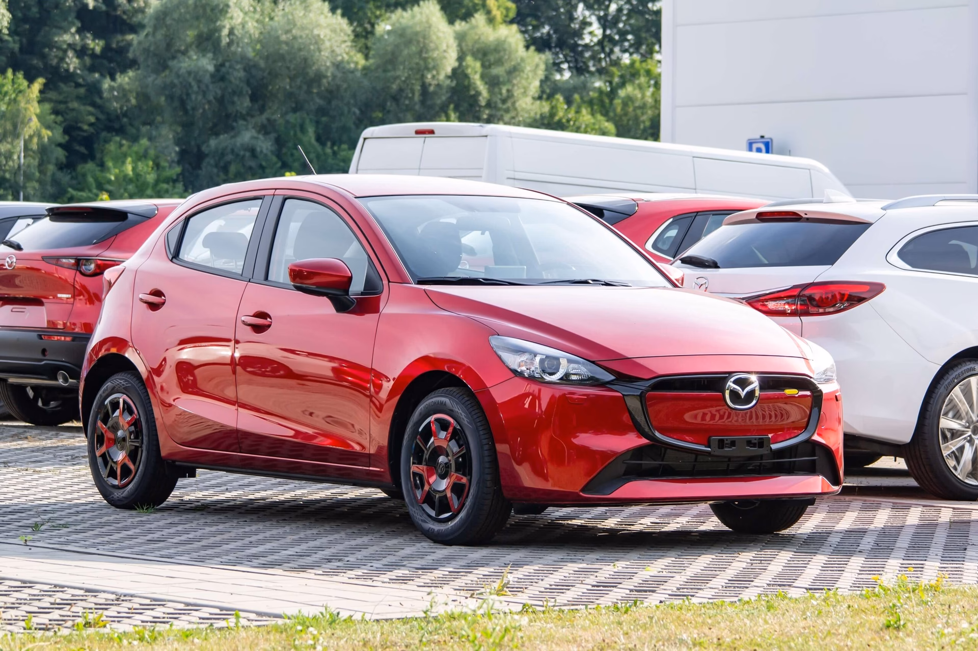 How do I get a service quote for my Mazda 2?