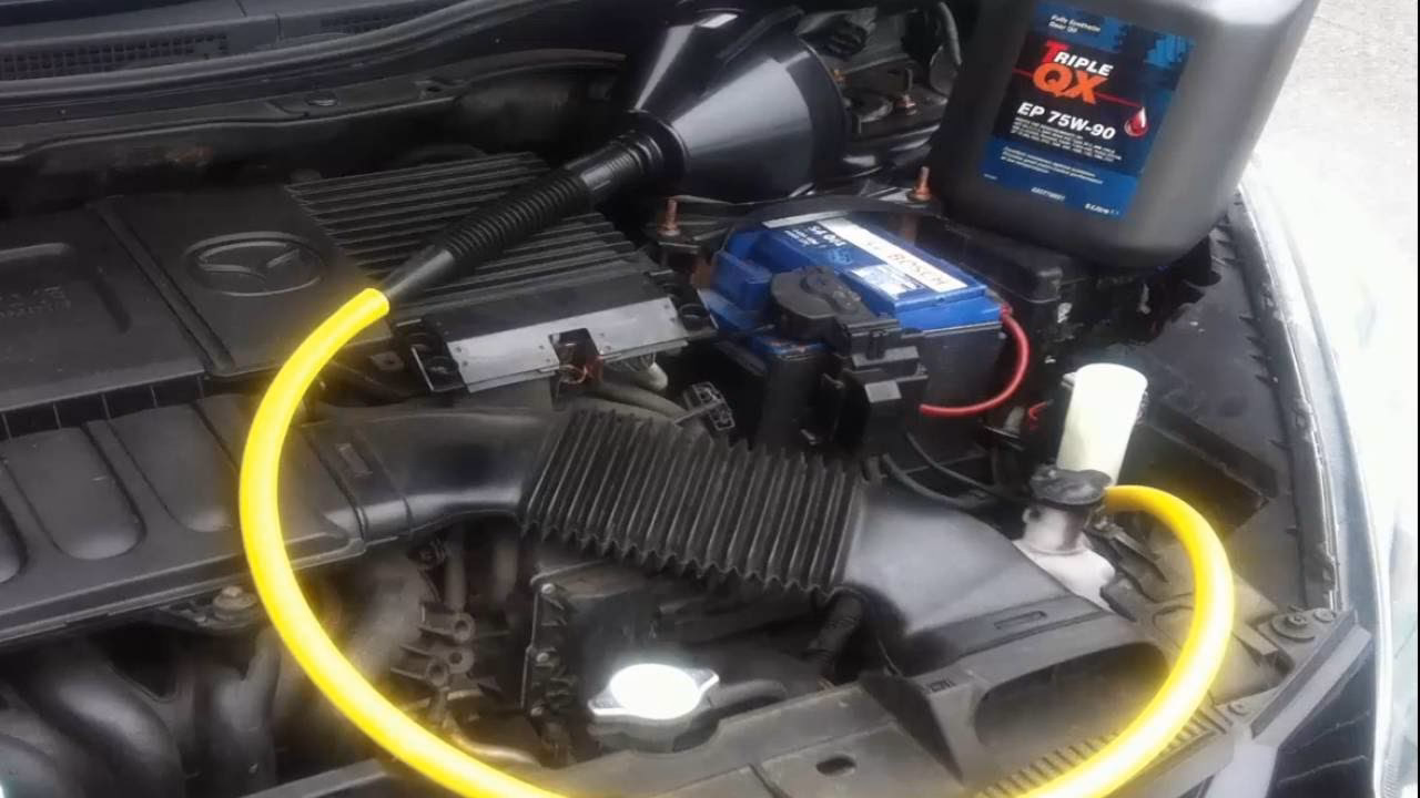 How often should a 2012 Mazda 2 Touring transmission fluid be replaced?