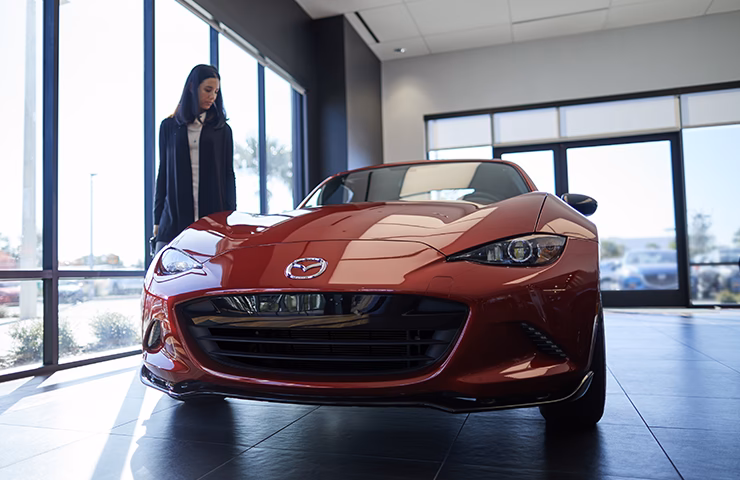 How does Mazda Motors (UK) contact me?