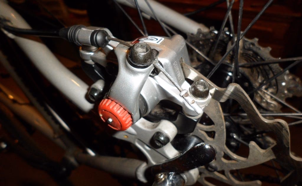 How do you align a mechanical disc brake?