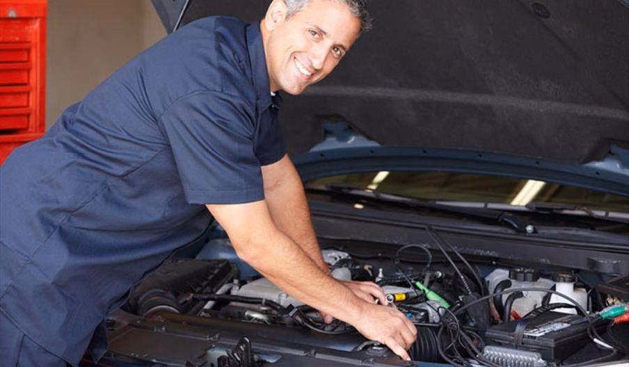 How do I book An MOT test at J & P Motors?