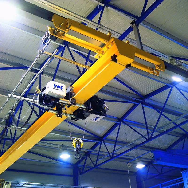 What is an electric overhead traveling (EOT) crane?