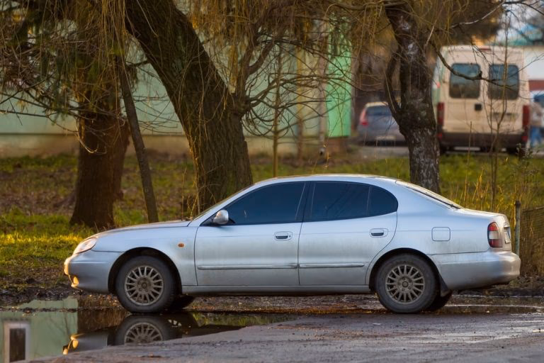Can a car be parked on a public road with no MOT?