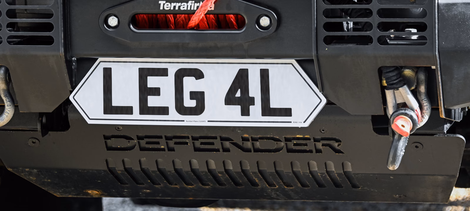 What are the spacing requirements on a number plate?