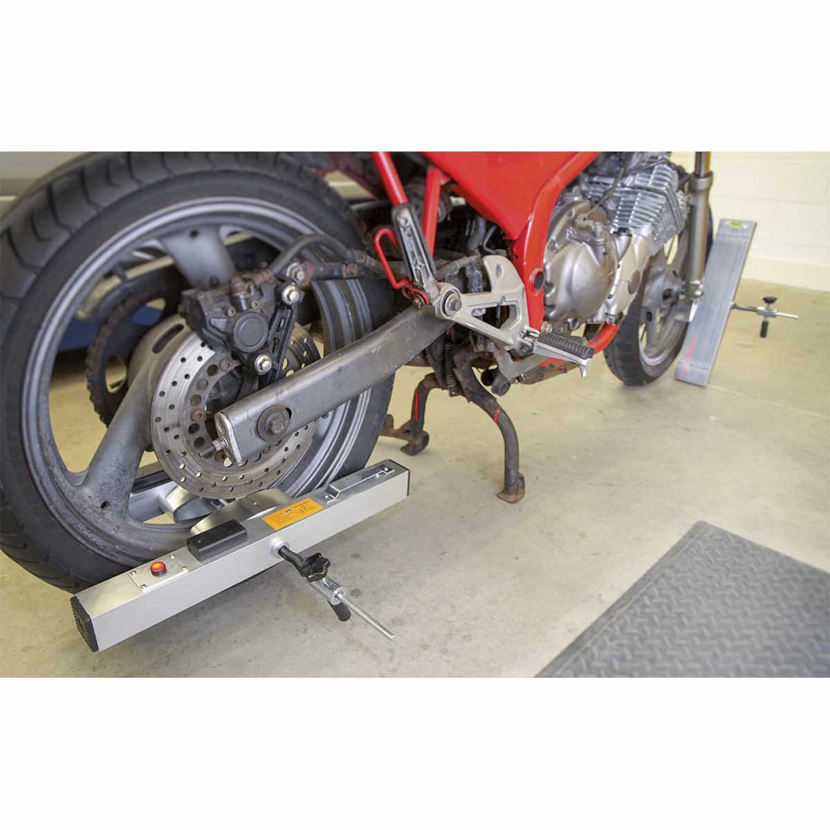 What is a dual purpose wheel balancer & truing stand?