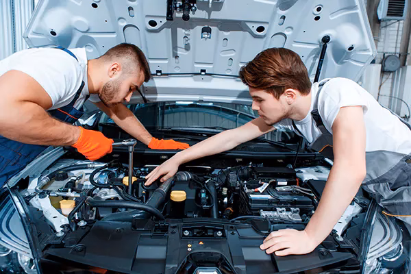 What is the difference between an MOT test and a service?