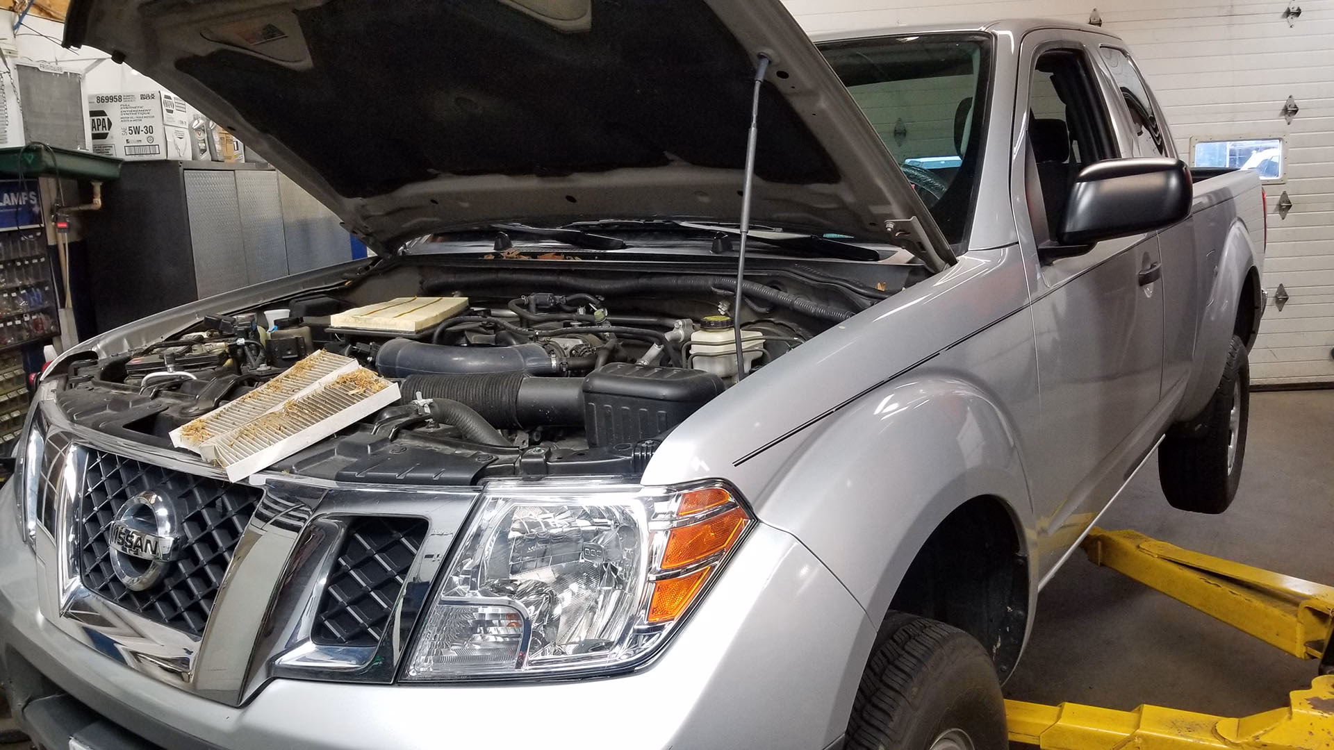 How do I Change my 2019 frontier oil filter?